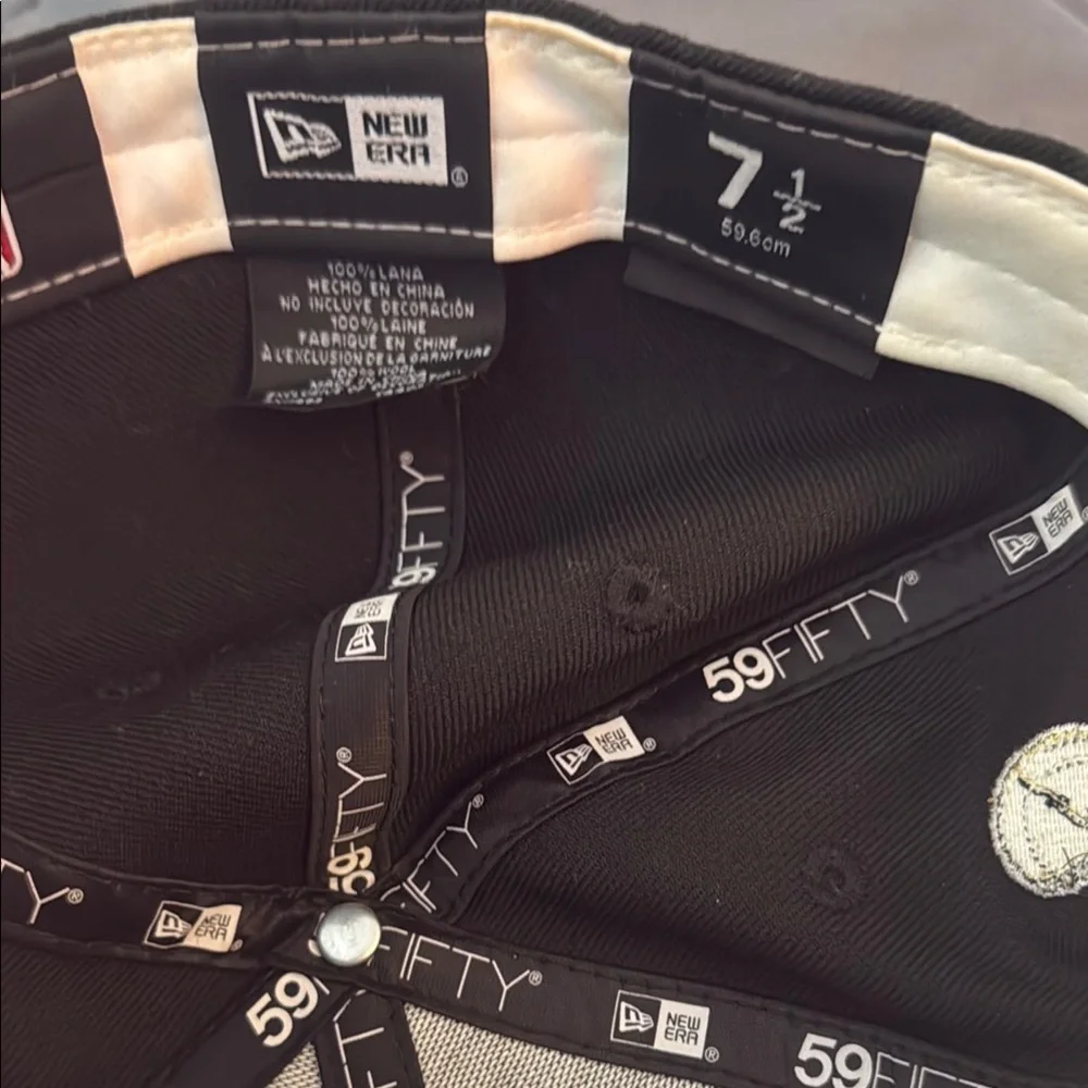 Like new may been wore few time — New Era Black and Purple Party Hat size 7 1/2